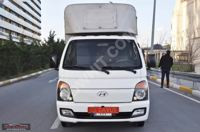 Hyundai H 100 truck model 2018 opens from 3 sides with a canopy