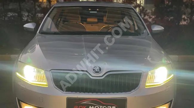 From R.O.K AUTOMOTIVE: Skoda Octavia automatic without paint and without defects, with an advance of 300,000 Turkish Lira