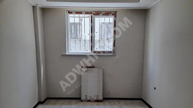 Apartment 2+1 on the ground floor with a garden near the MENDERES metro station, new and suitable for loans from TEKDEMİRD