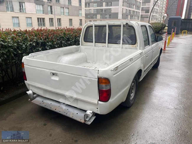 1999 Ford Ranger, double cab, with a towing document