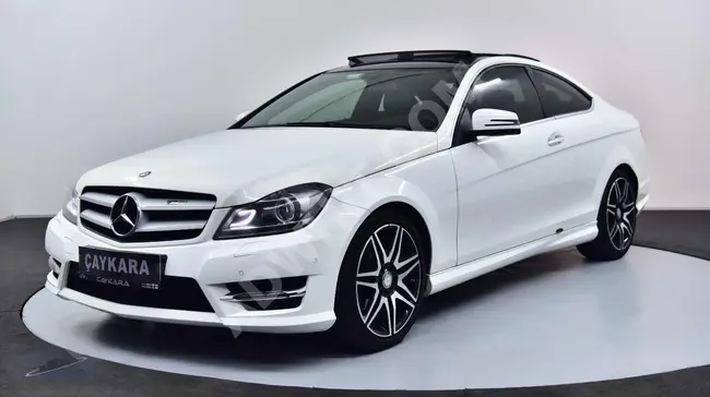 2015 مرسيدس بنز C180 كوبيه - 112,000 كم - AMG Plus - بدون سجل حوادث