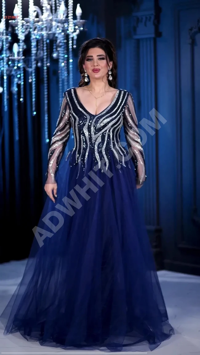 Long evening dress with rhinestones and long sleeves