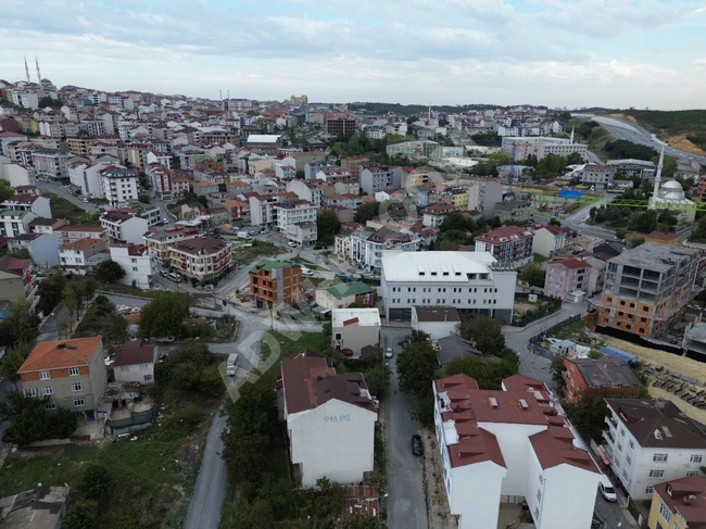 Plot of land with an area of 251 square meters facing the main road, suitable for construction and divided in the ARNAVUTKÖY MERKEZ area