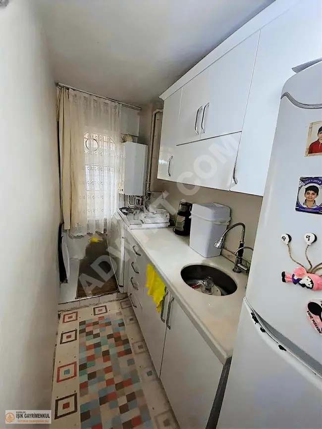 For sale, a 1+1 apartment on the ground floor by IŞIK Real Estate Company