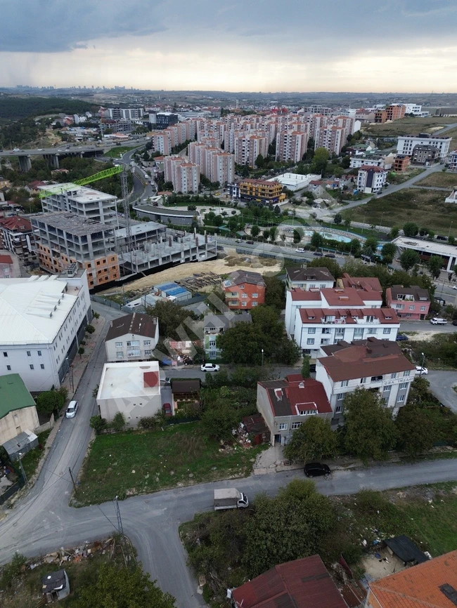 Plot of land with an area of 251 square meters facing the main road, suitable for construction and divided in the ARNAVUTKÖY MERKEZ area