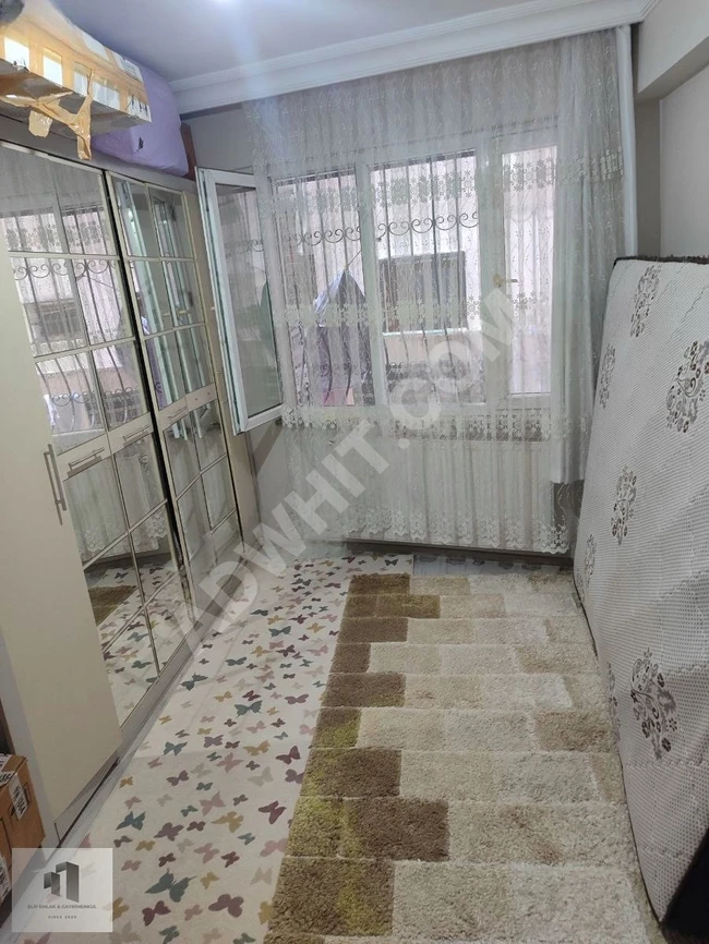 Apartment 3+1 for sale on the ground floor with a garden suitable for a loan - from ELİF EMLAK