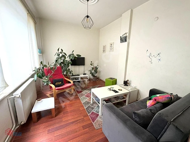 Apartment for sale in Beşiktaş on the street, middle floor, double-sided view with a balcony