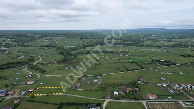 A plot of land with an area of 2214 m2 with a separate deed on the main road within the village of ÇATALCA BİNKILIÇ