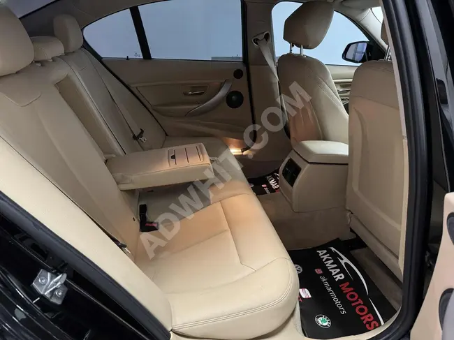 2014 BMW 3.20D car with M steering wheel, NBT system, and HARMAN sound system for sale from AKMAR MOTORS