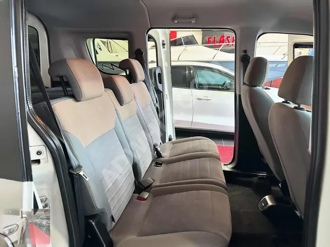 Fiat 2015 Doblo Premio free of defects, 300,000 Turkish Lira down payment, with the possibility to pay the rest in installments over 12, 24, or 36 months using bonds