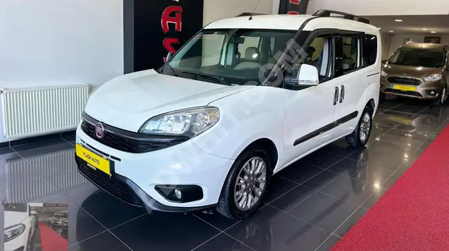 Fiat 2015 Doblo Premio free of defects, 300,000 Turkish Lira down payment, with the possibility to pay the rest in installments over 12, 24, or 36 months using bonds