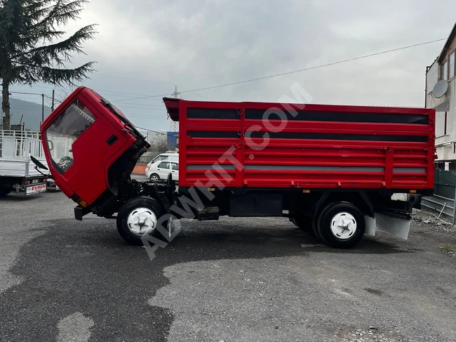 Mitsubishi truck model 1997 with steel tipper 449 and new duplex tires