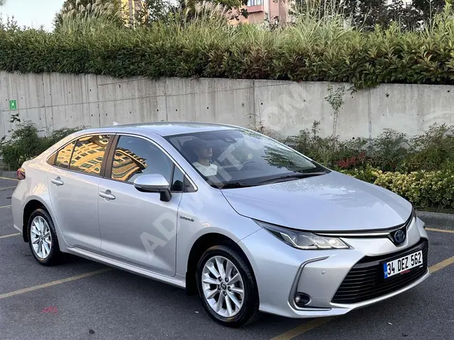 2020 Corolla 1.8 Hybrid Dream 83,000 km, guaranteed, unmatched