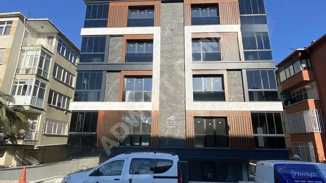 Central store for sale in a new building by HİTİT EMLAK