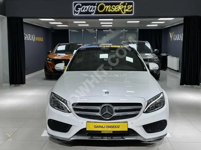 مرسيدس C200 AMG  احدث اصدار بدون عيوب 105 كم مع امكانية التقسيط على 36 شهر