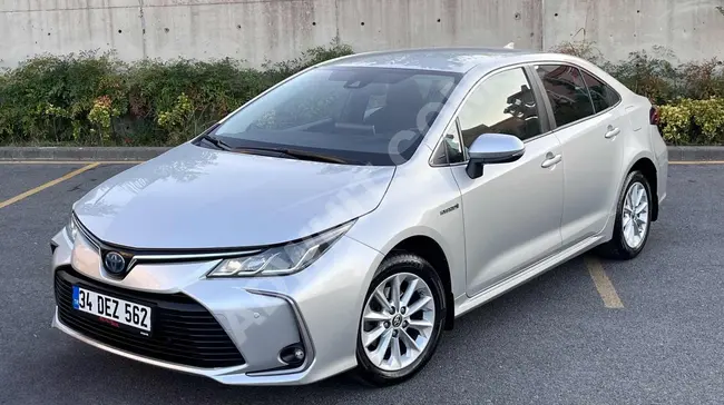 2020 Corolla 1.8 Hybrid Dream 83,000 km, guaranteed, unmatched