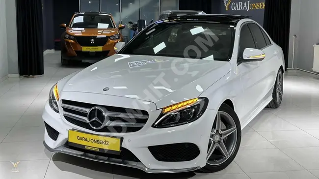 مرسيدس C200 AMG  احدث اصدار بدون عيوب 105 كم مع امكانية التقسيط على 36 شهر