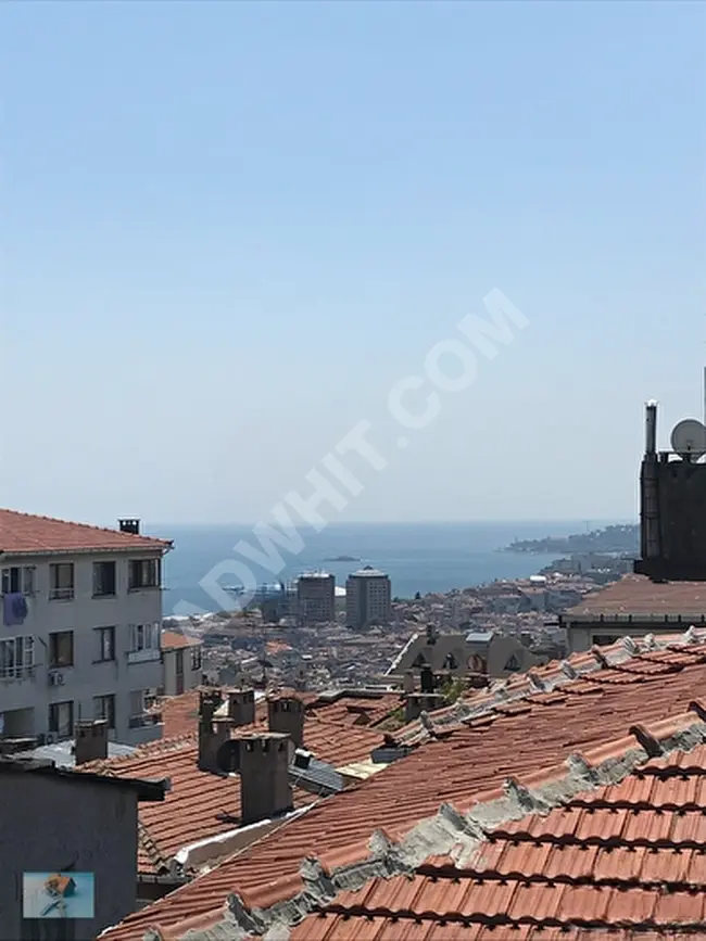 3+2 apartment for sale, new building (ten years old) with elevator and parking spaces, sea view