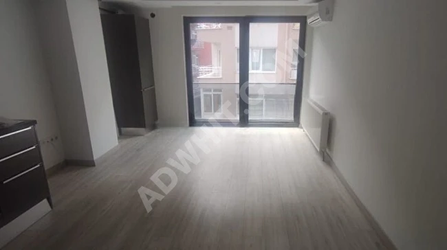 Apartment 1+1 in a new building (2 years) with central heating - from TİAMO EMLAK