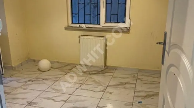 Apartment for sale 2+1 in a spacious building, 80 square meters with central heating, balcony, elevator, and parking - garden floor - from TİAMO