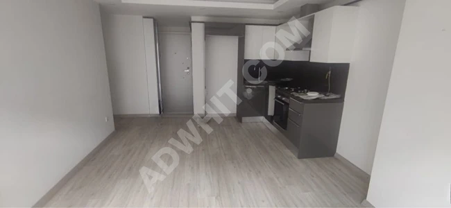 Apartment 1+1 in a new building (2 years) with central heating - from TİAMO EMLAK