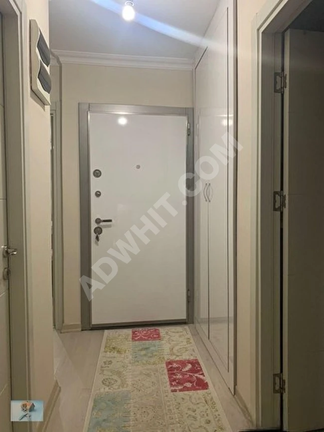 From TİAMO: Apartment in a modern building (5 years old) ground floor with an area of 60m², 2+1, central heating and American kitchen