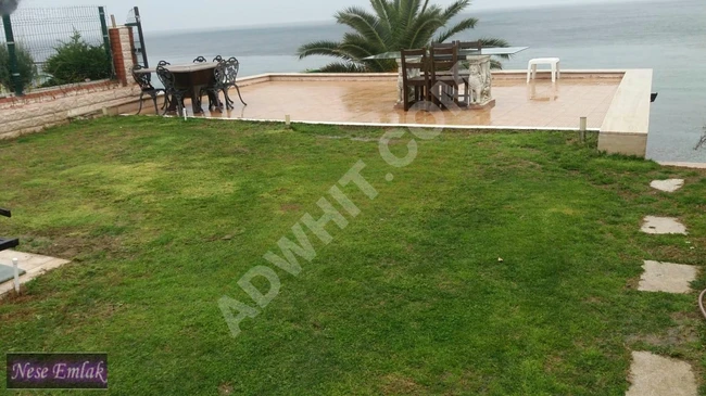 Villa for sale facing the sea, empty, with a pool in GÜZELCE