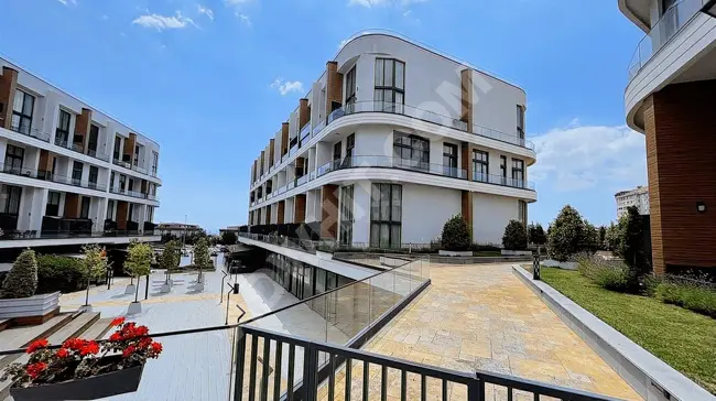 Apartment for sale with a balcony and sea view in Beylikdüzü, type 1+1