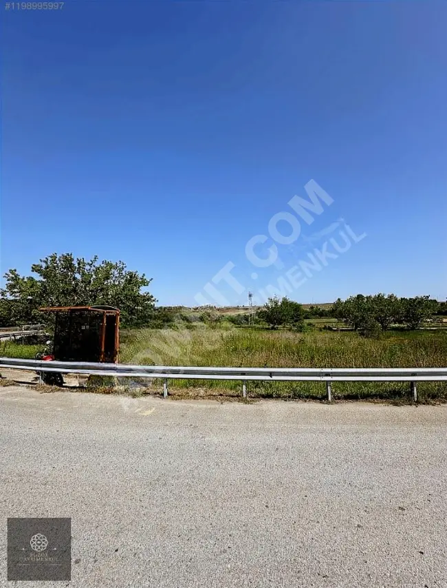 A plot of land at the intersection, on a dual carriageway, opposite the industrial area