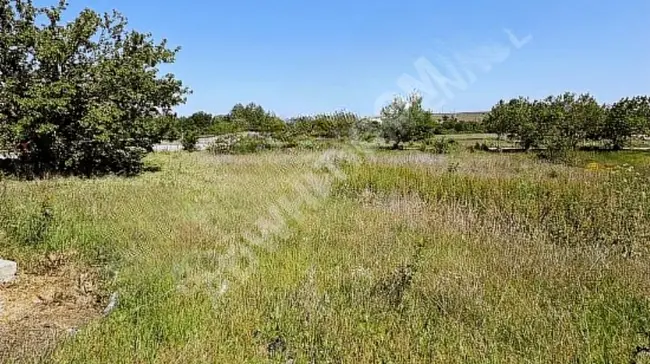 A plot of land at the intersection, on a dual carriageway, opposite the industrial area