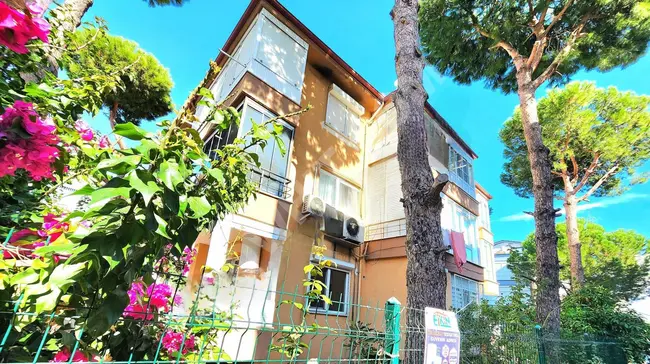 Apartment 2+1 for sale, ground floor with garden in a vibrant location - by AKÇAY BEST EMLAK