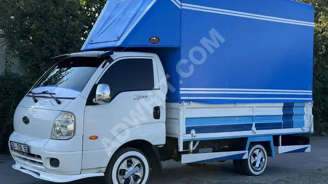 شاحنة Kia Bongo K2500 موديل 2006 مع خيمة صفراء بدون عيب وبدون خطأ