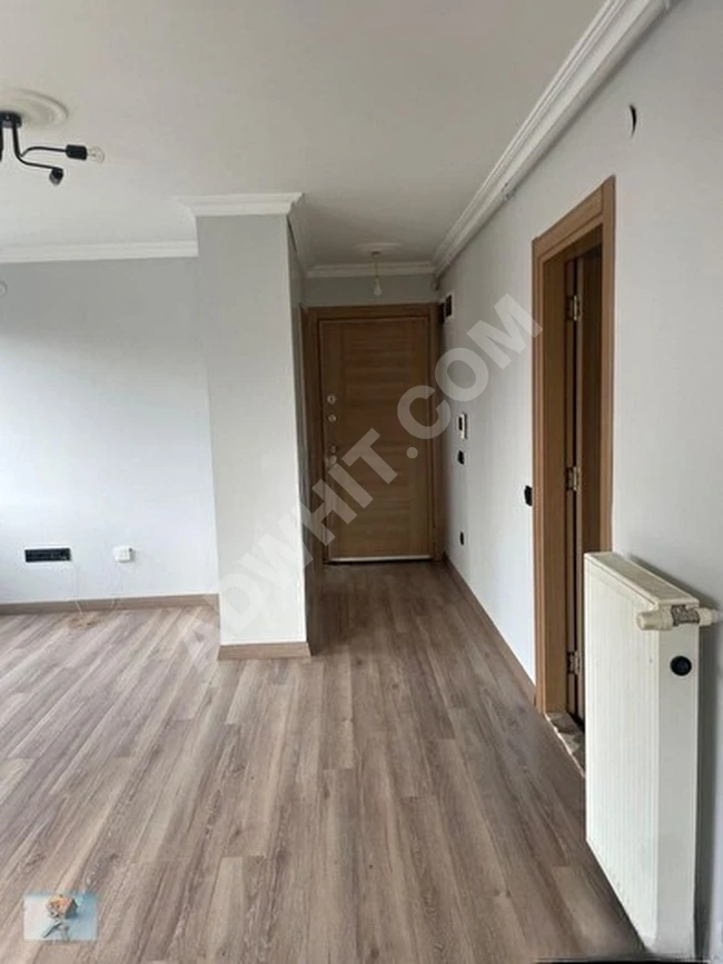 1+1 apartment with an area of 60 square meters, in a new building, central heating, integrated kitchen set (American kitchen) - from TİAMO EMLAK