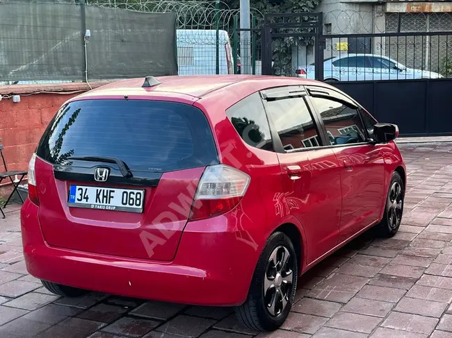 Car for sale HONDA JAZZ model 2009 with a distance of 144,000 km / manual transmission