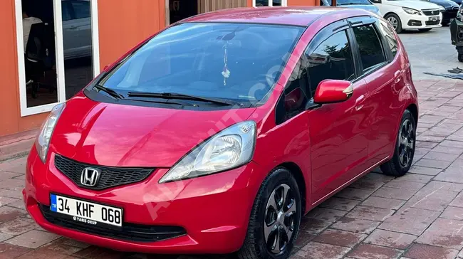 Car for sale HONDA JAZZ model 2009 with a distance of 144,000 km / manual transmission