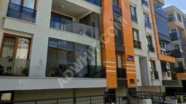 For sale a new apartment with a closed parking lot and an elevator in SİTELER