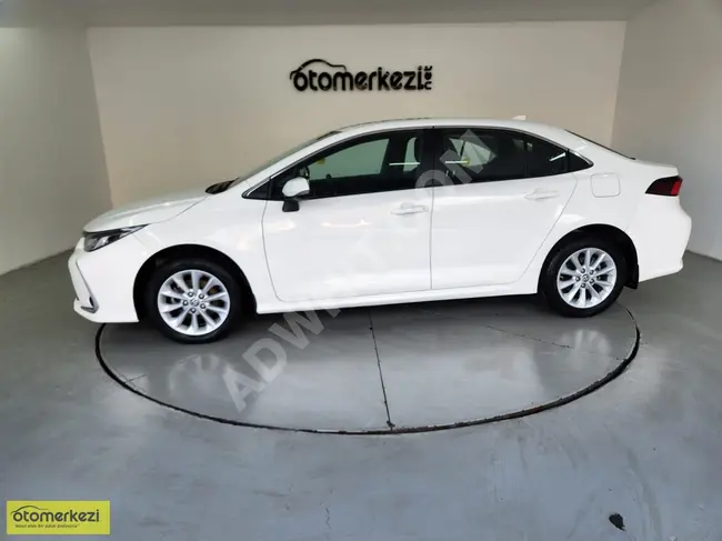 TOYOTA COROLLA 1.8 HYBRİD DREAM - امكانية مقايضة - مع ضمان ثلاثة أشهر - من OTOMERKEZİ