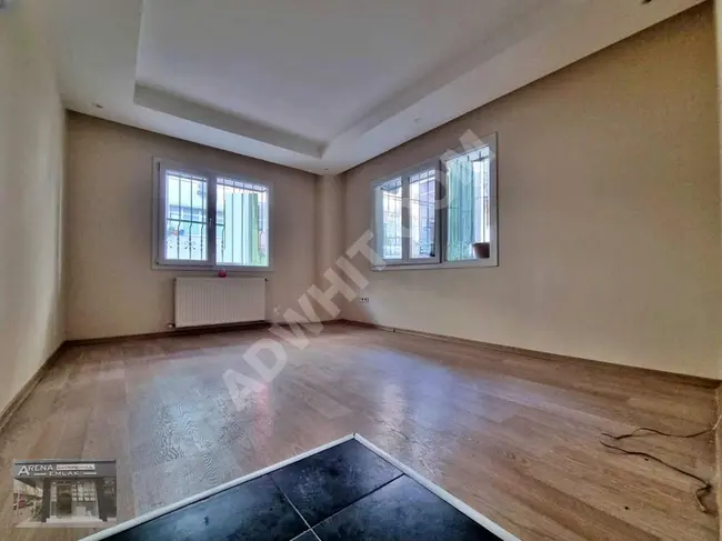 ARENA | 1+1 apartment with an area of 65 m² on a high ground floor in a 7-year-old building