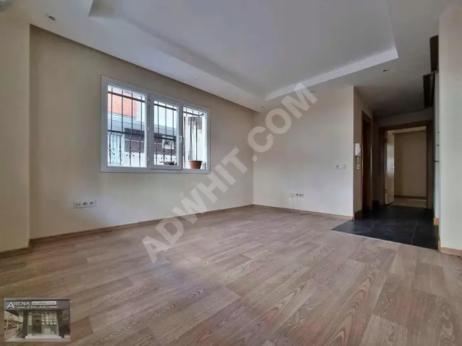 ARENA | 1+1 apartment with an area of 65 m² on a high ground floor in a 7-year-old building