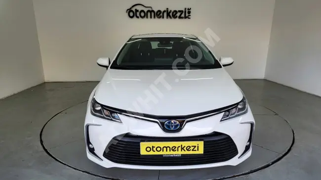 TOYOTA COROLLA 1.8 HYBRİD DREAM - امكانية مقايضة - مع ضمان ثلاثة أشهر - من OTOMERKEZİ