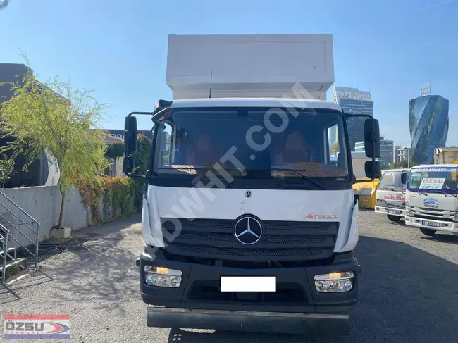 MERCEDEZ ATEGO 1518 truck, model 2021, for home-to-home transport with a multi-purpose container