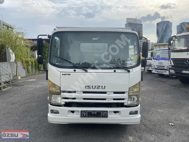 ISUZU NPR 8 truck model 2012 with a metal chassis