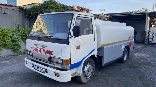 HINO model 1993 with a fuel tank and a centrifugal pump counter