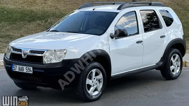 2012  Dacia DUSTER 1.5 DCİ - عداد اصلي 152000 كم - جنط فولاذي - مكيف - من WINCARS