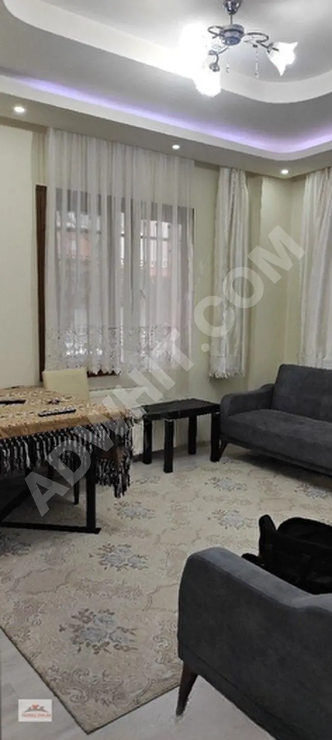 Apartment 2+1 in a modern building 6 years old, elevated ground floor. In SİRİNEVLER