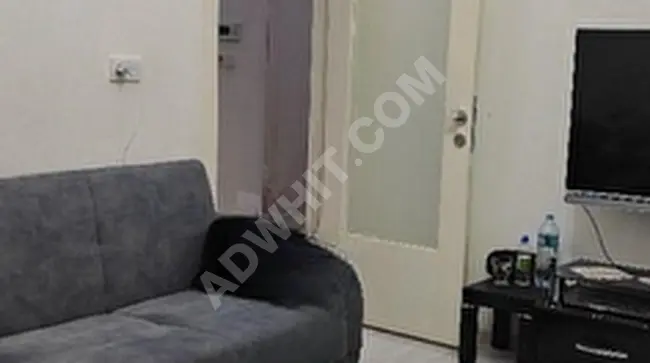 Apartment 2+1 in a modern building 6 years old, elevated ground floor. In SİRİNEVLER