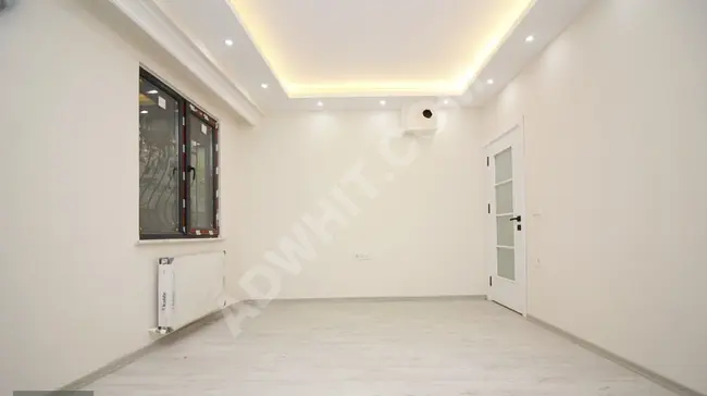 Apartment for sale with an area of 3+1 on the ground floor in BAHÇELİEVLER YAYLA