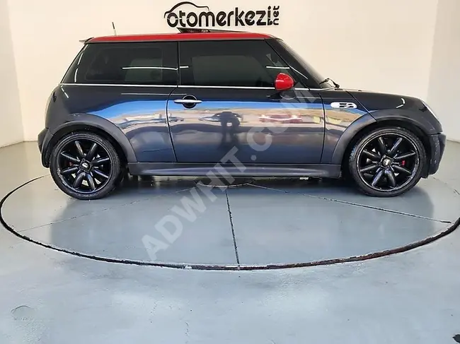 Mini Cooper موديل 2006 إمكانية شراء سيارة بالتقسيط بدون دفعة أولى وخيارات سداد على مدى 12، 18، 24، أو 36 شهرًا.