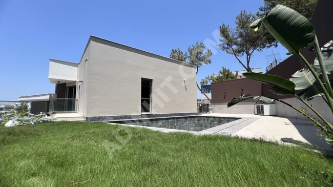 Villa with three luxurious floors for sale with a unique view in Kuşadası