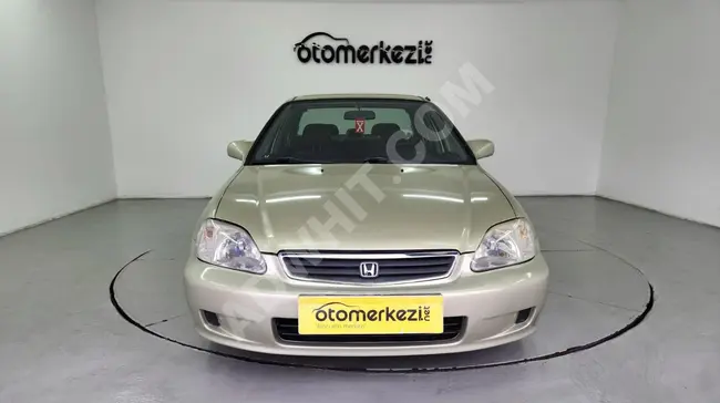 Honda CİVİC- İ ES، إمكانية الدفع بالتقسيط على 12 شهرًا باستخدام بطاقة الائتمان - من OTOMERKEZİ